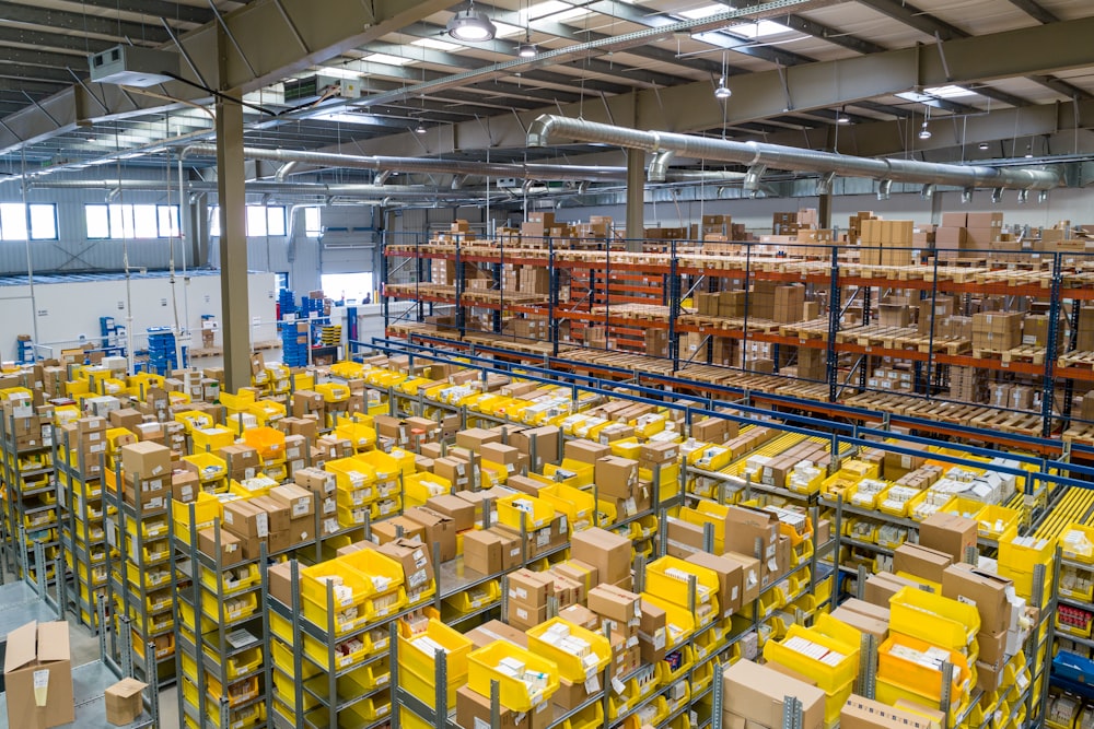 A fulfilment warehouse stacked with order bins and parcels