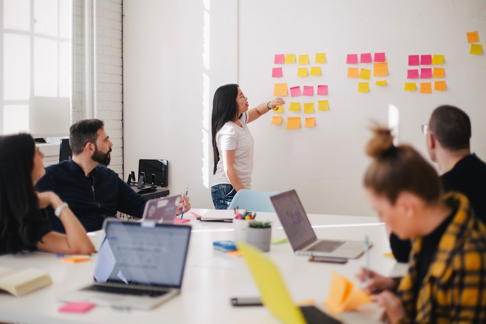 A marketing team reviewing growth dashboards together